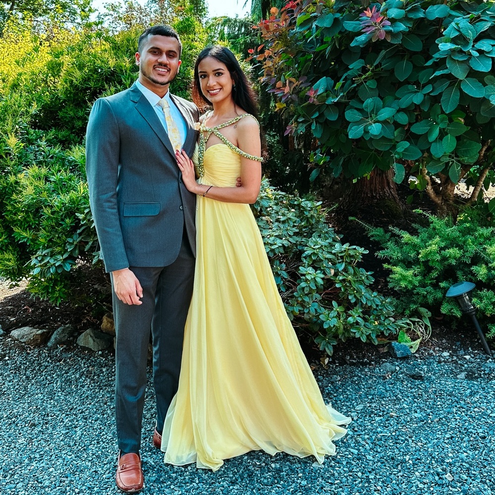 Sherri Hill Yellow a-line gown